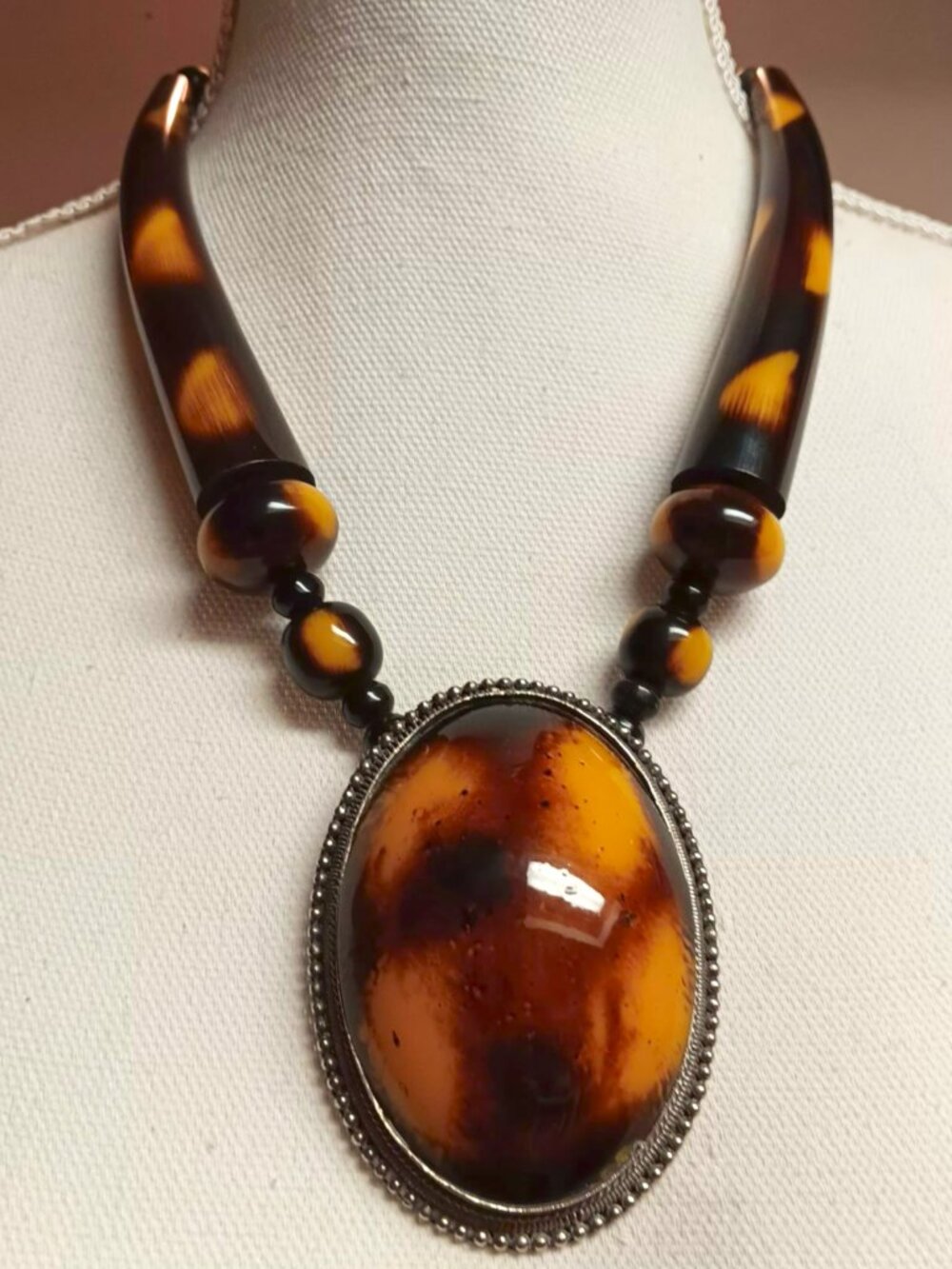Tribal style black, yellow & brown statement necklace.